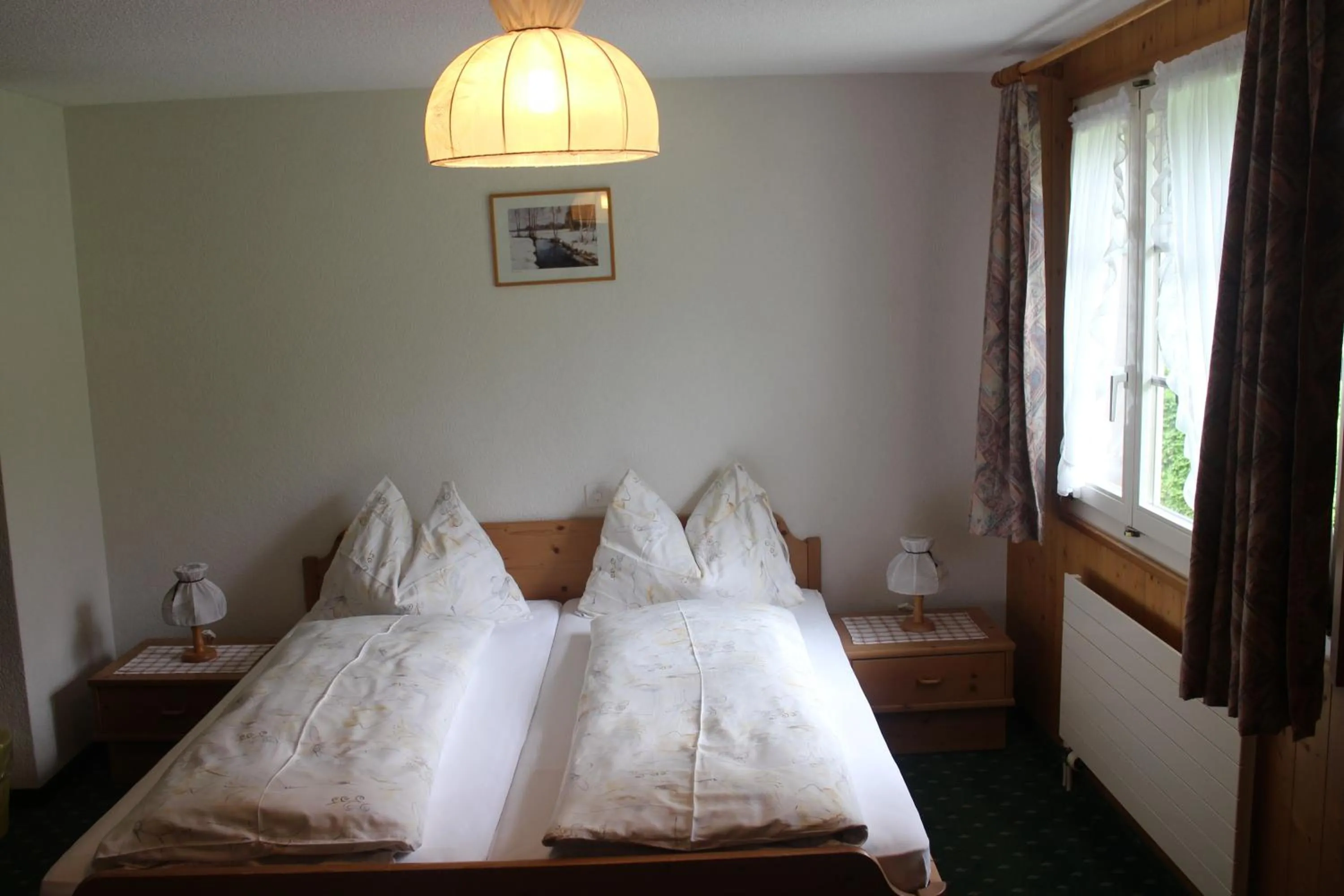 Bed in Hotel Blümlisalp
