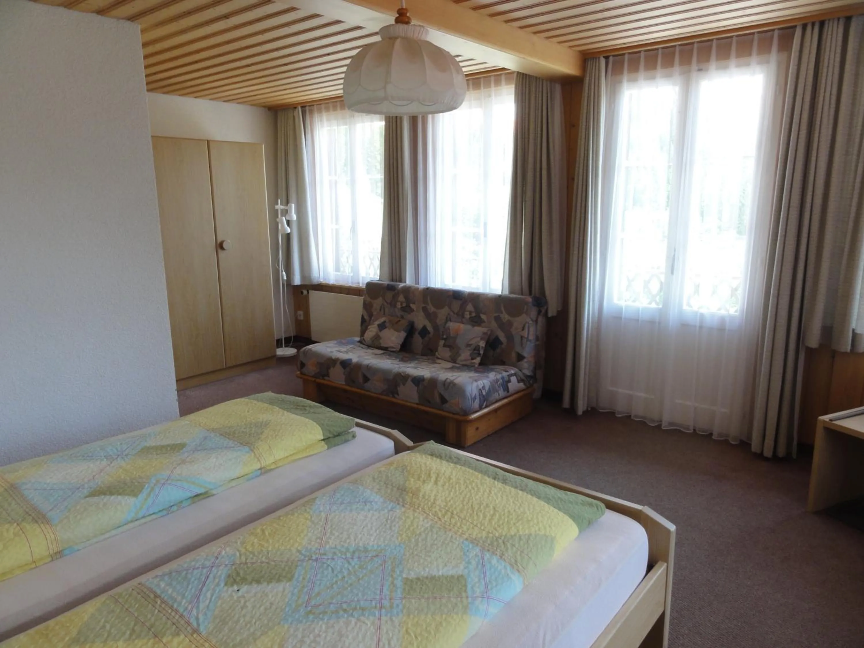 Bed in Hotel Blümlisalp