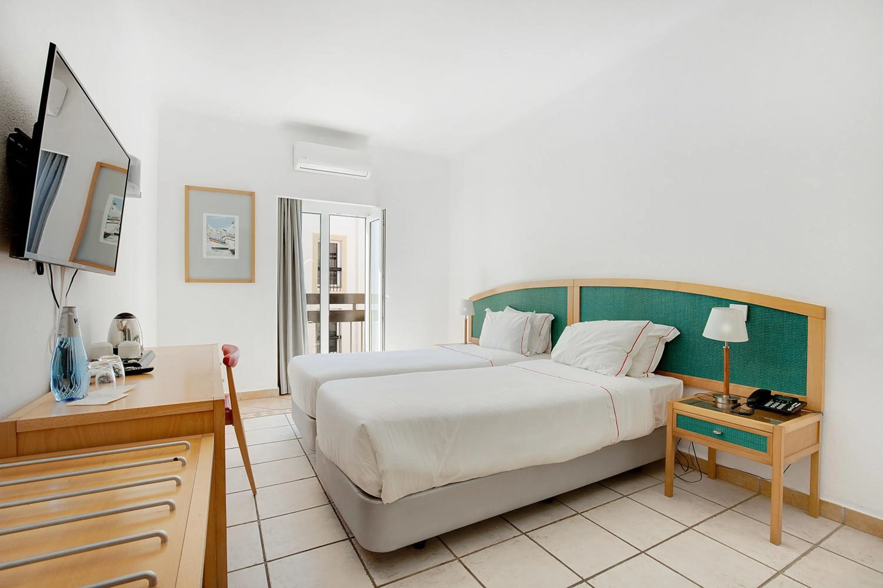 Bed in Hotel Carvoeiro Plaza