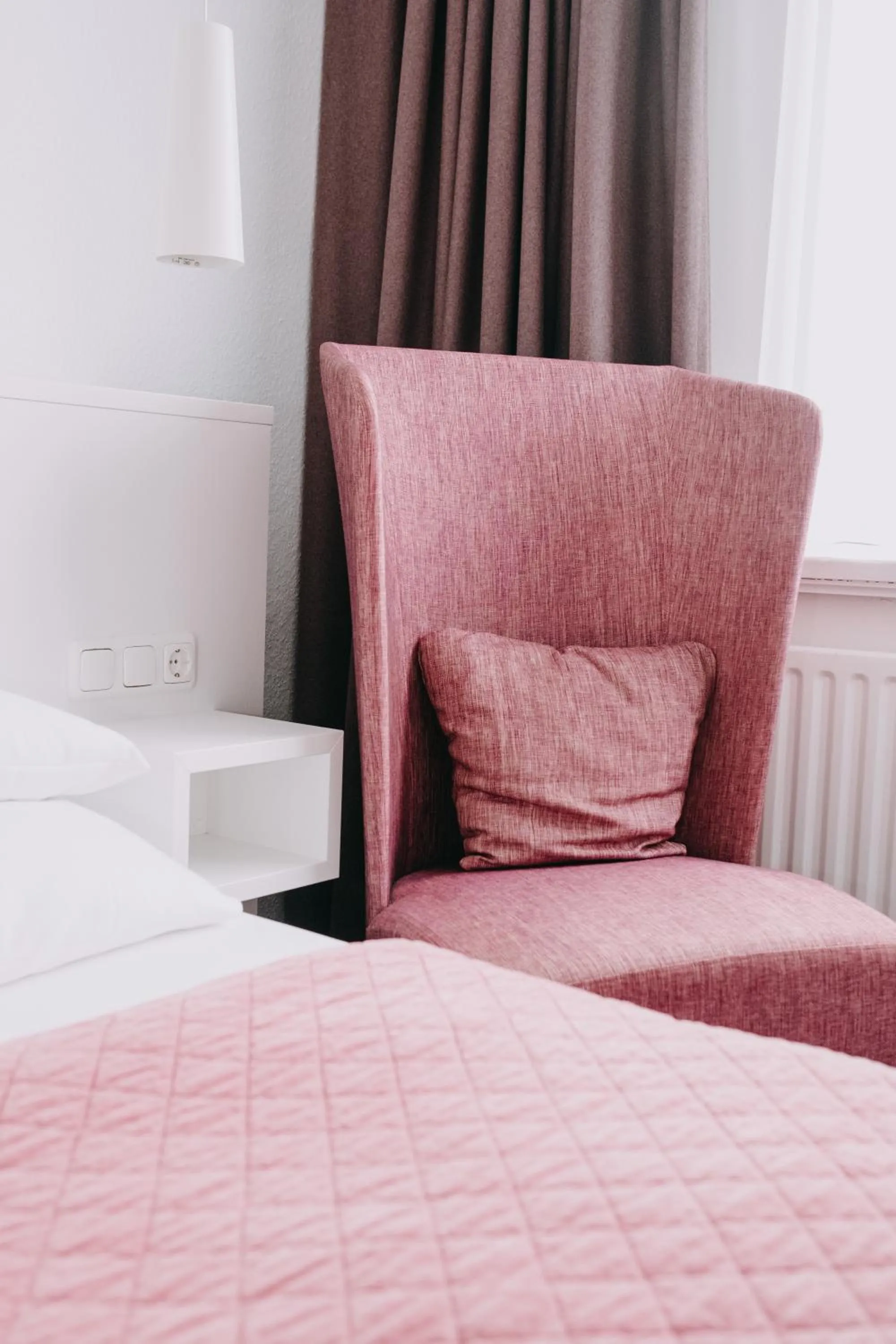 Seating area, Bed in meerzeit Hotel