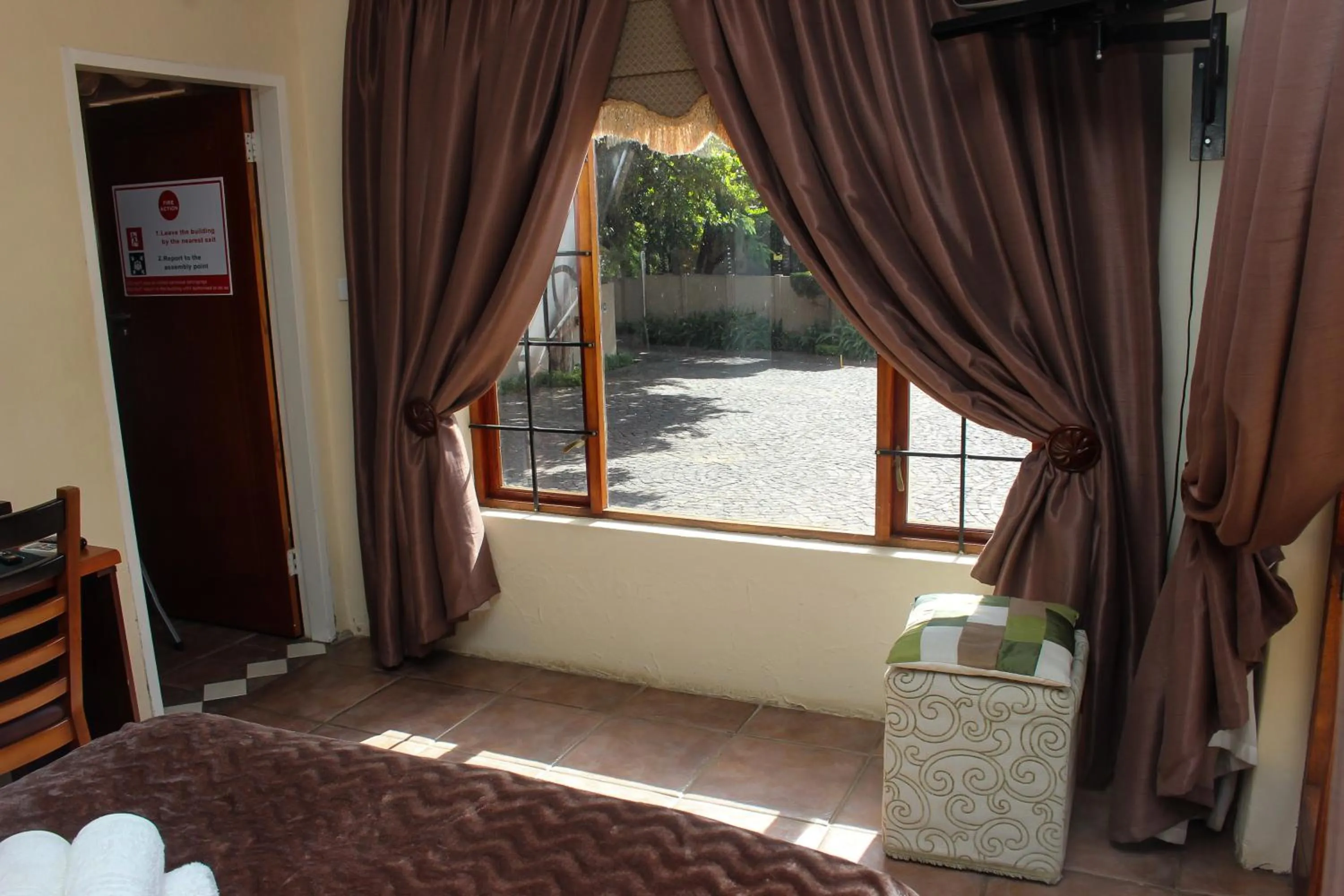 Bed in Echo Garden Guesthouse