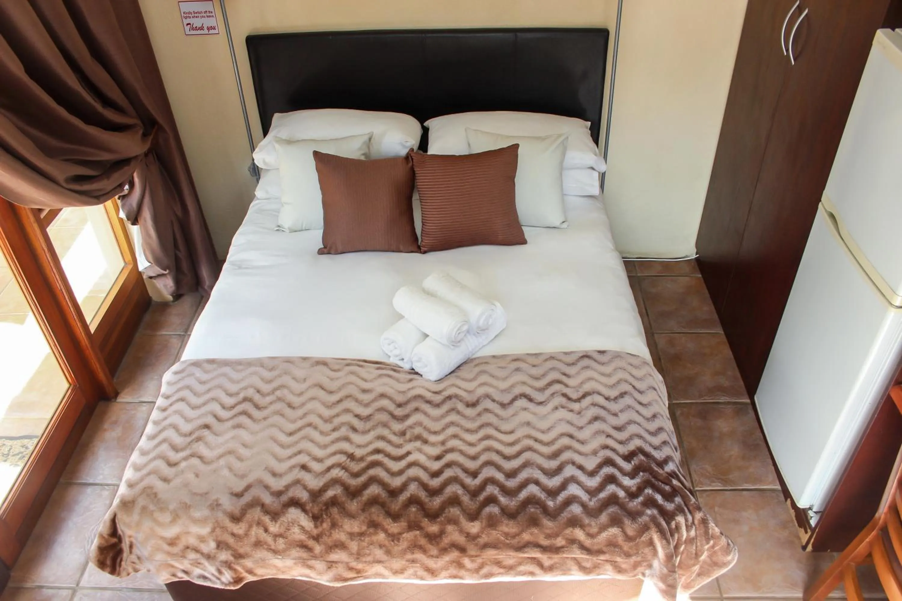 Bed in Echo Garden Guesthouse