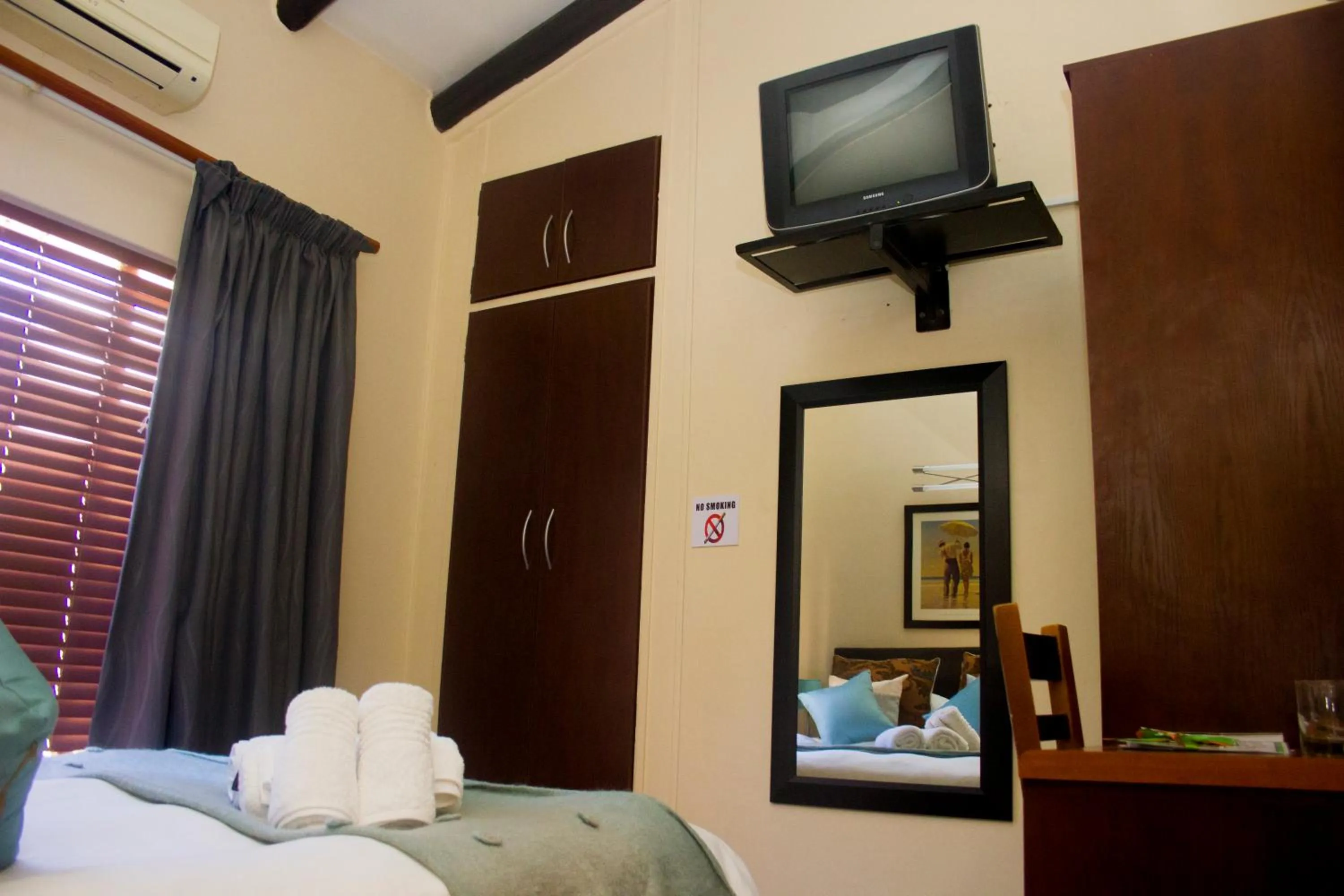 Bed in Echo Garden Guesthouse