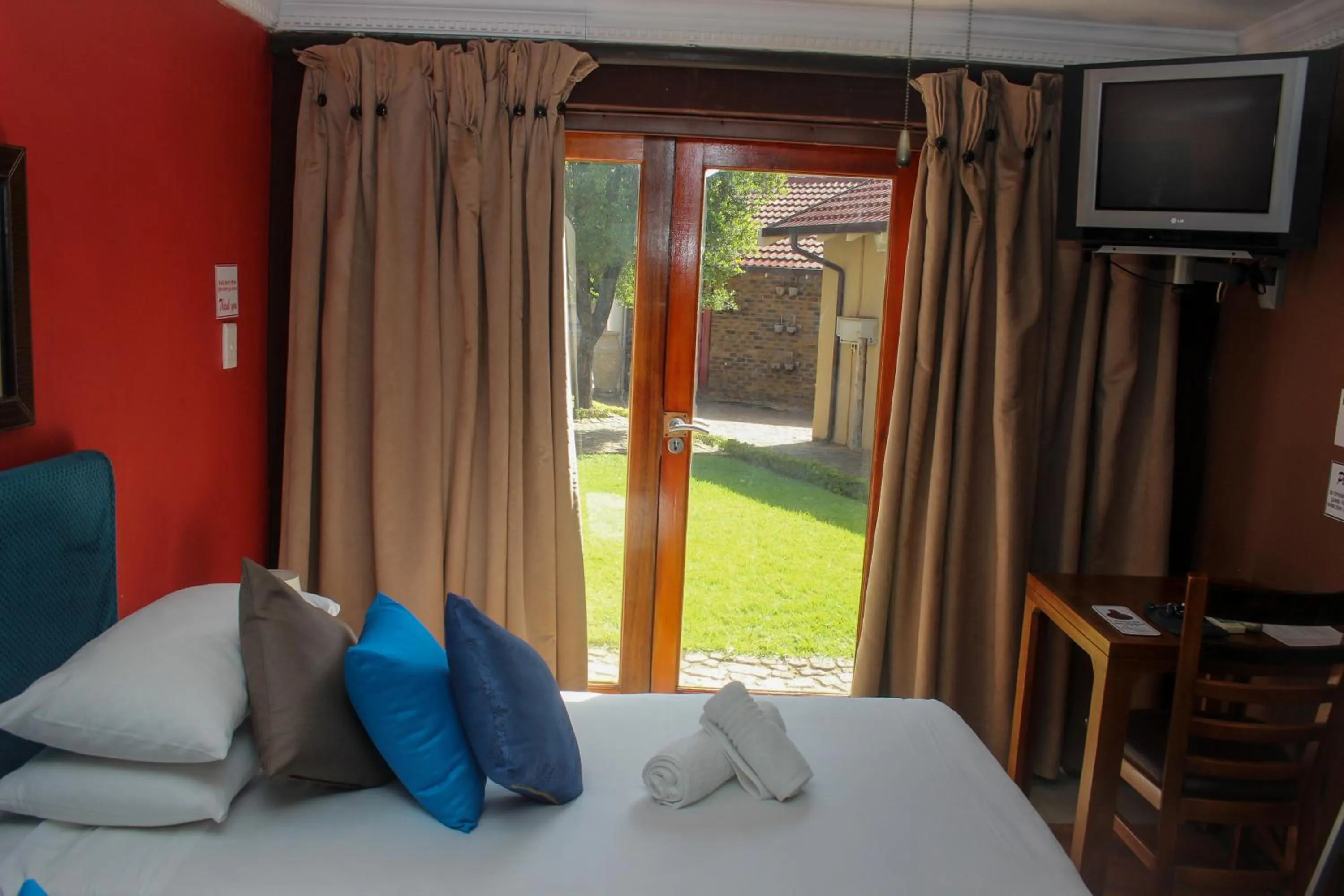 Bed in Echo Garden Guesthouse