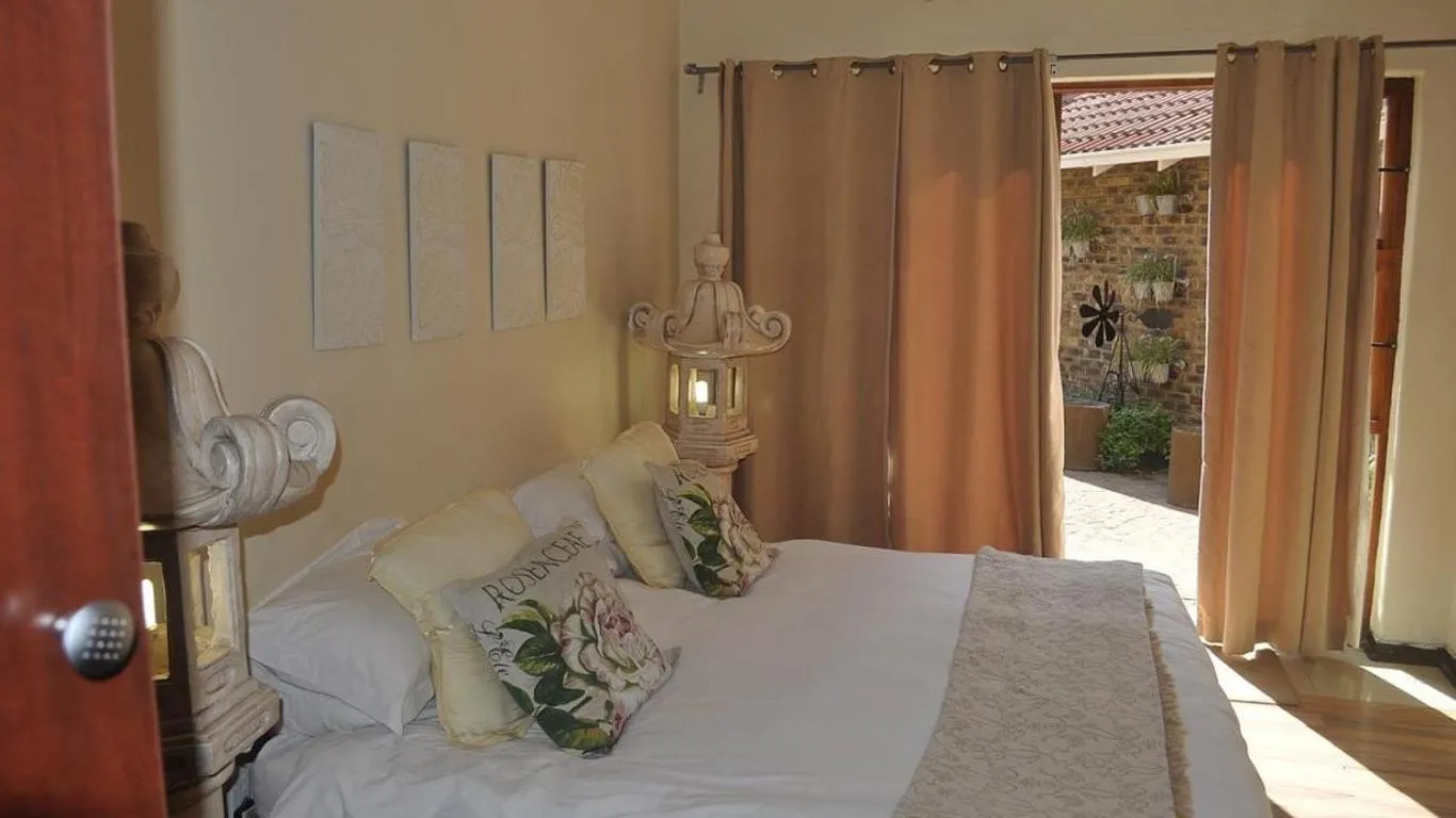 Bed in Echo Garden Guesthouse