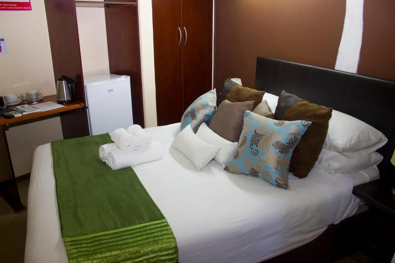 Bed in Echo Garden Guesthouse