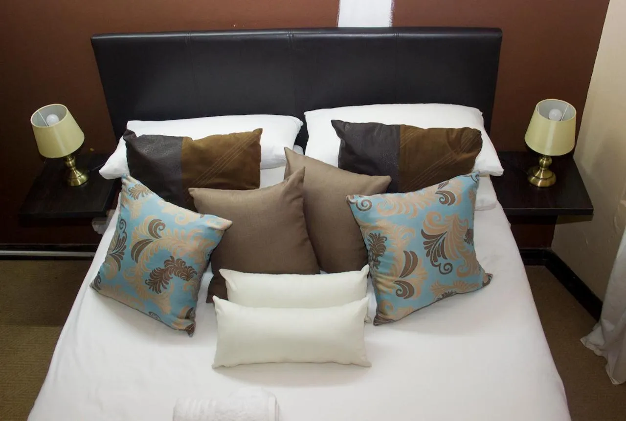 Bed in Echo Garden Guesthouse