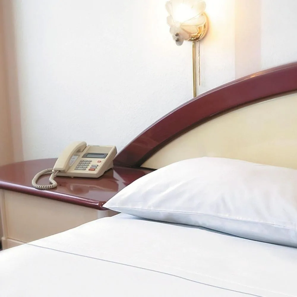 Bed in Americana Hotel