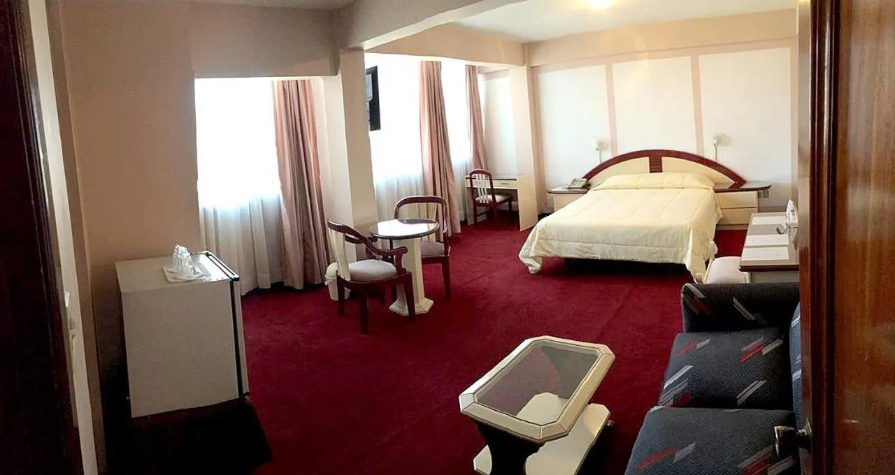 Photo of the whole room, Bed in Americana Hotel