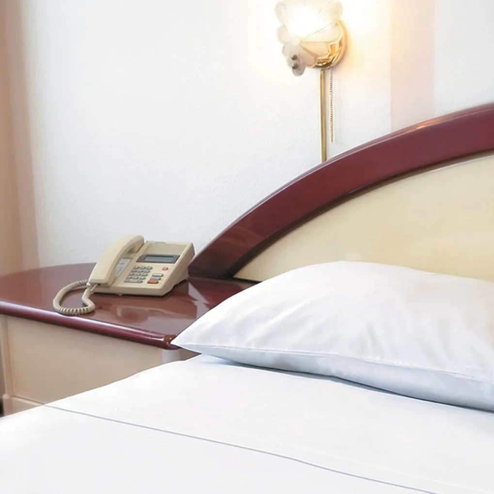 Bed in Americana Hotel