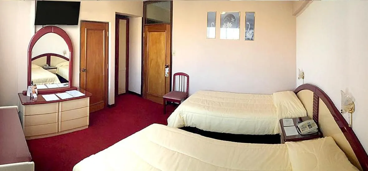 Photo of the whole room, Bed in Americana Hotel