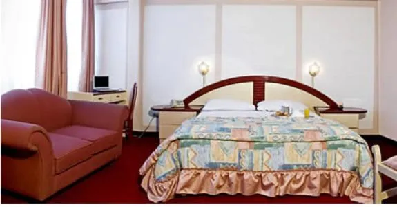 Bed in Americana Hotel