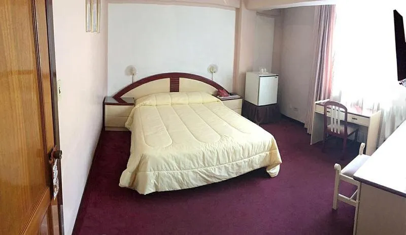 Photo of the whole room, Bed in Americana Hotel