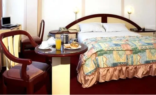 Bed in Americana Hotel