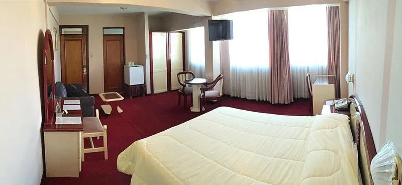 Photo of the whole room, Bed in Americana Hotel