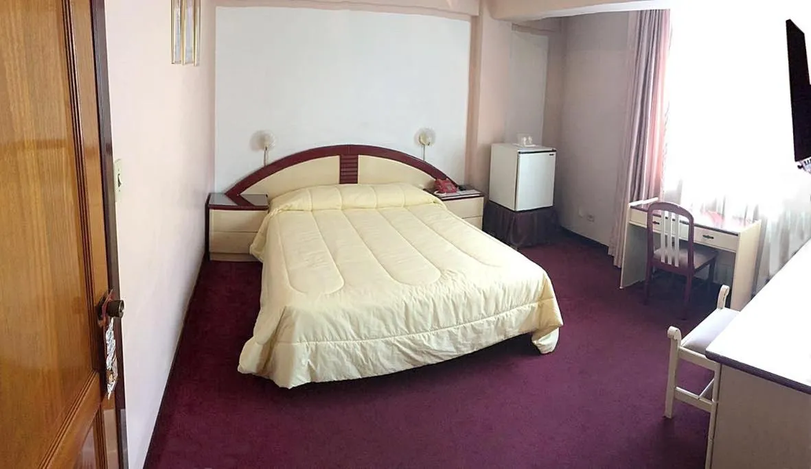 Bed in Americana Hotel