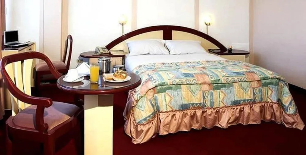 Bed in Americana Hotel