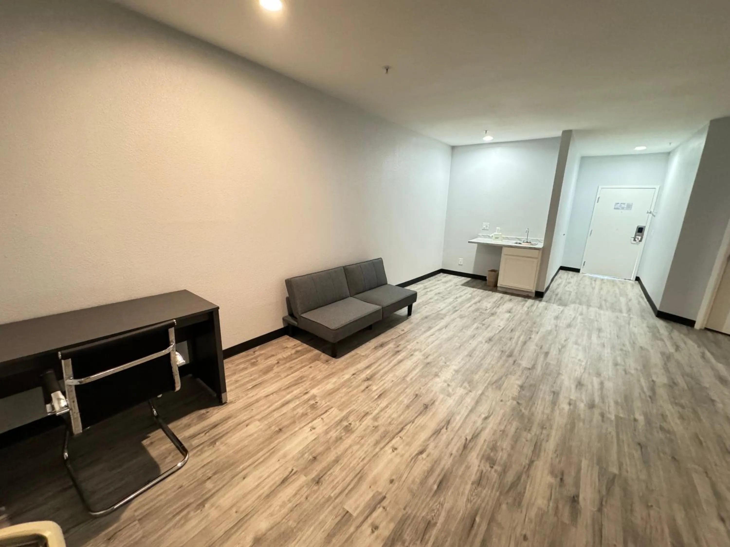 Living room in Americas Best Value Inn & Suites Haltom City Ft. Worth