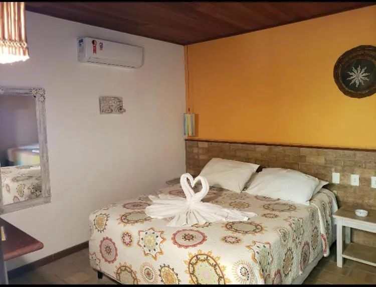 Bed in Pousada Bichelenga