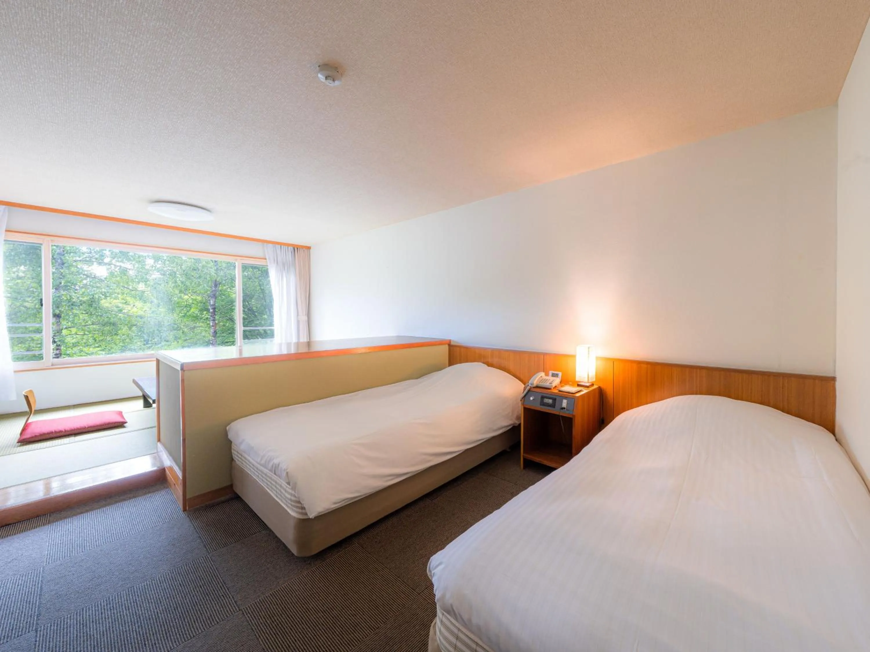 Bed in Okunikko Konishi Hotel