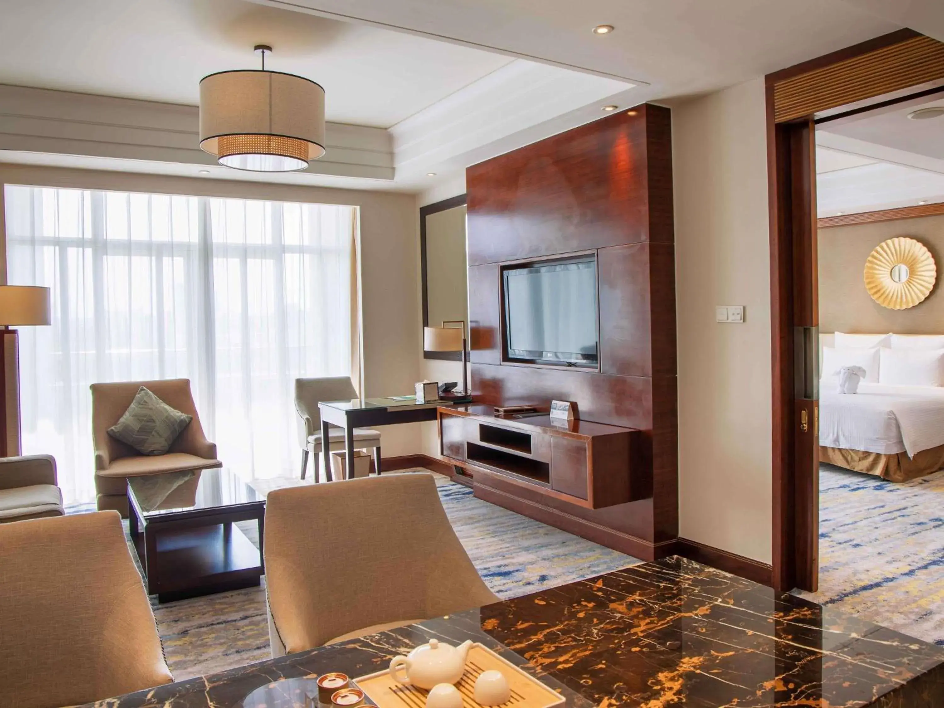 Deluxe King Suite with Sea View and Balcony in Pullman Haikou Deluxe King Suite with Sea View and Balcony in Pullman Haikou