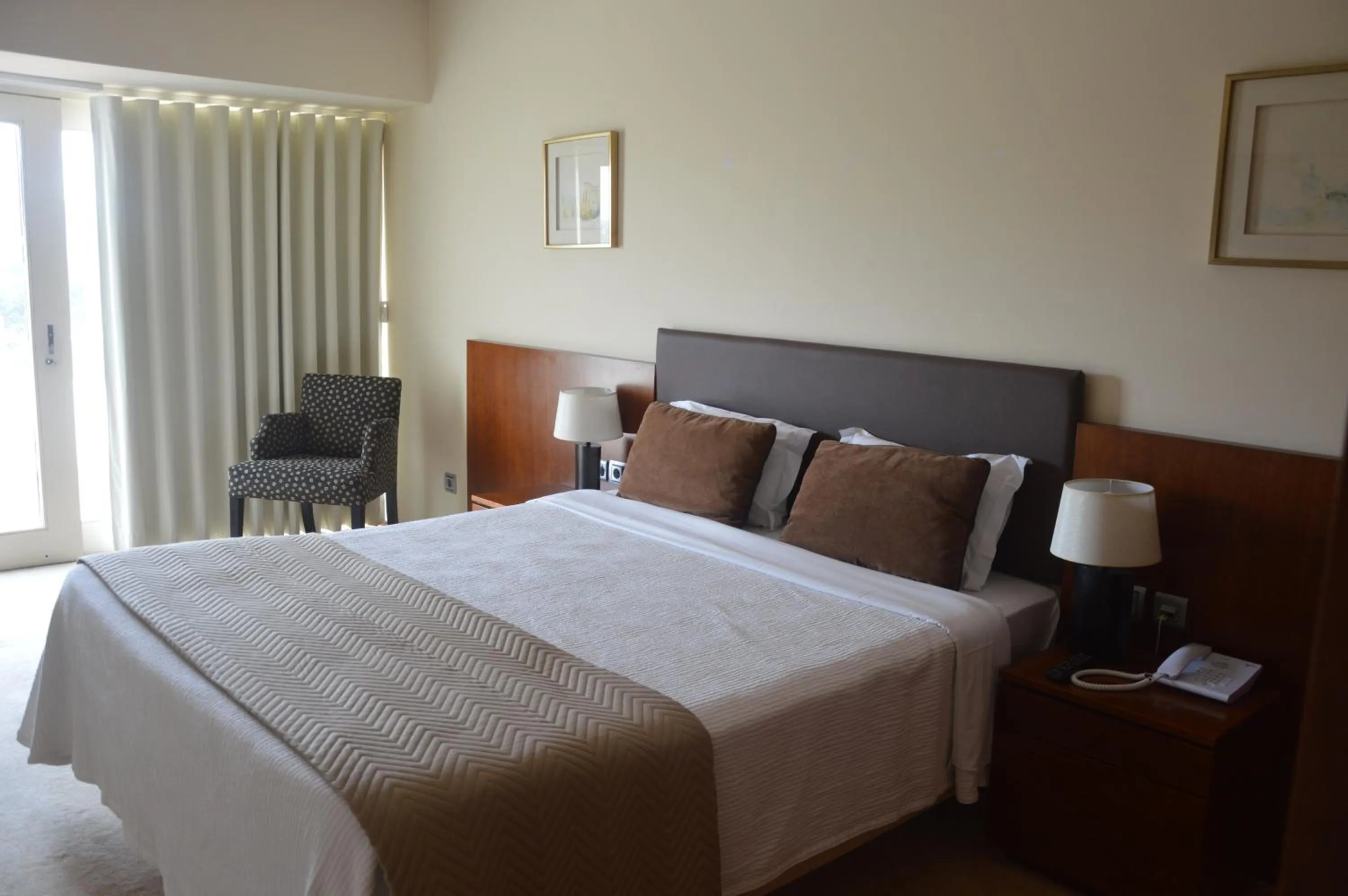 Bed in Santana Hotel & SPA