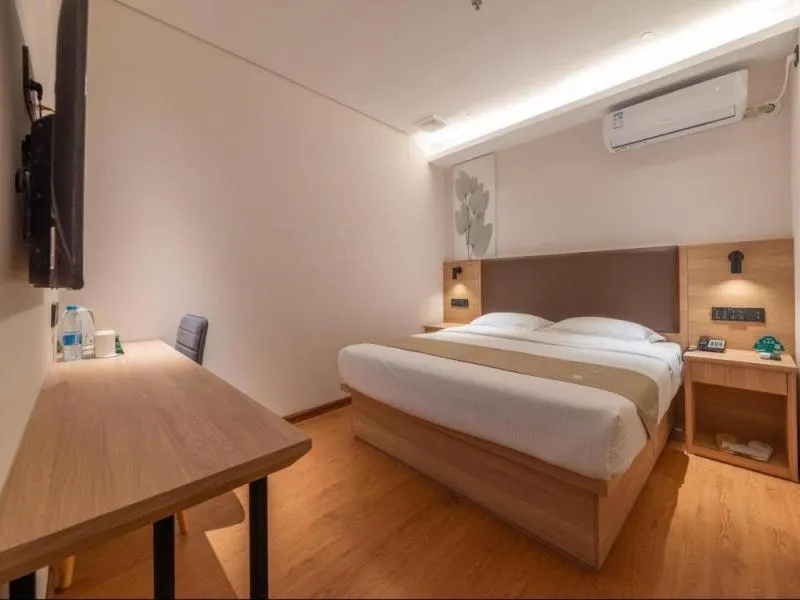 Bed in GreenTree Inn Ji‘nan Shanda Road Business Hotel