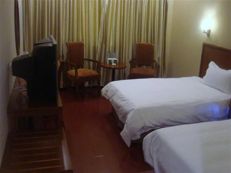 Bed in GreenTree Inn Ji‘nan Shanda Road Business Hotel