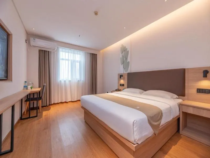 Bed in GreenTree Inn Ji‘nan Shanda Road Business Hotel