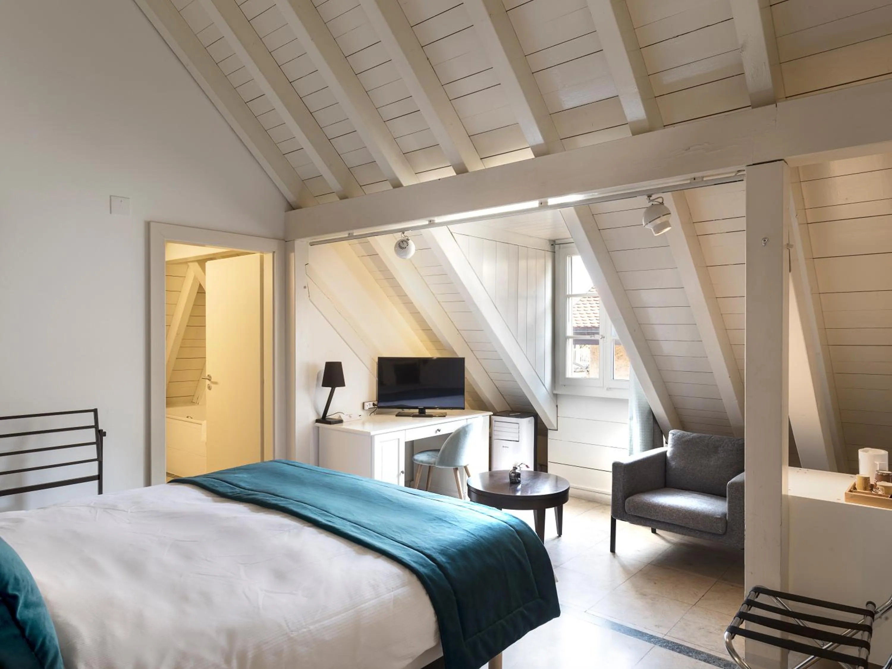 Photo of the whole room, Bed in L'Hôtel by Hostellerie du Château