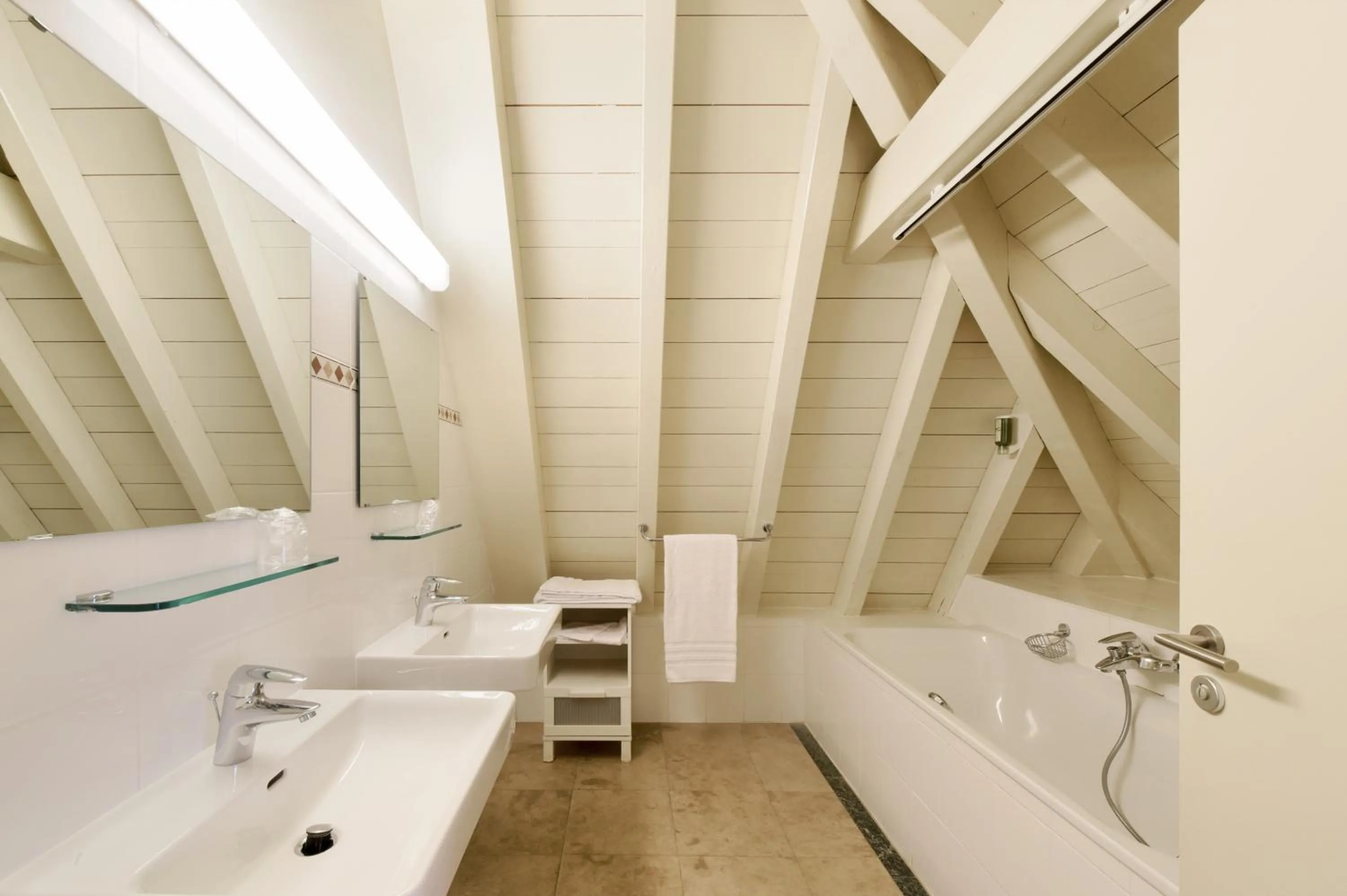 Bathroom in L'Hôtel by Hostellerie du Château