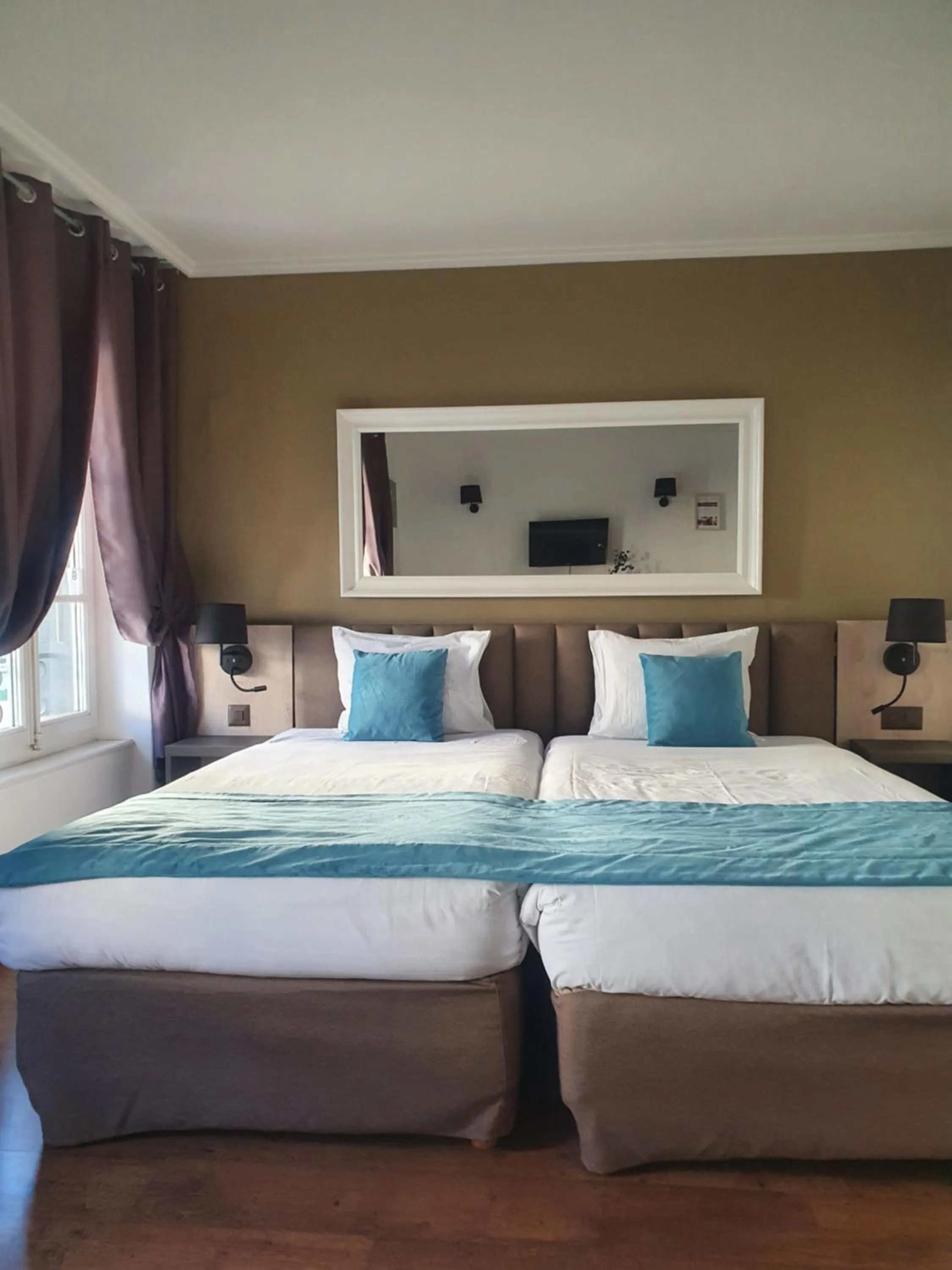 Bed in L'Hôtel by Hostellerie du Château