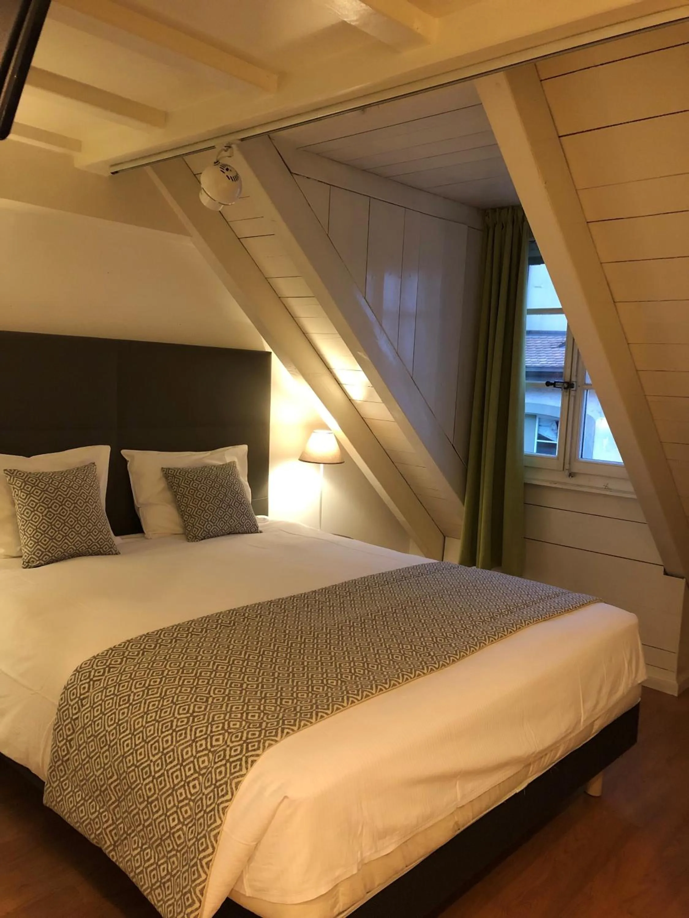 Photo of the whole room, Bed in L'Hôtel by Hostellerie du Château