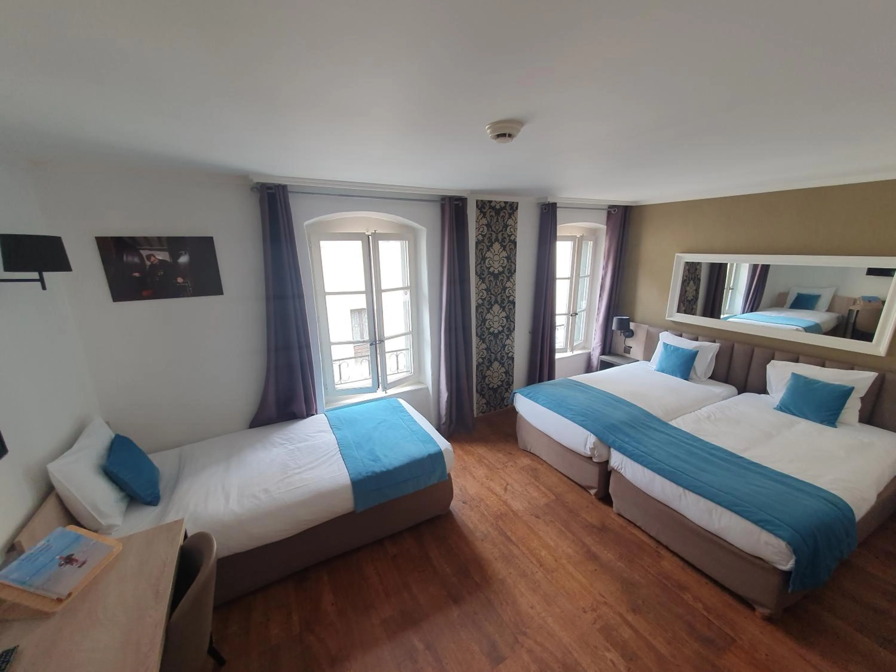 Photo of the whole room, Bed in L'Hôtel by Hostellerie du Château