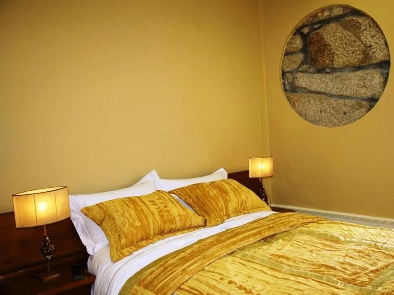 Bed in Pedra Iberica