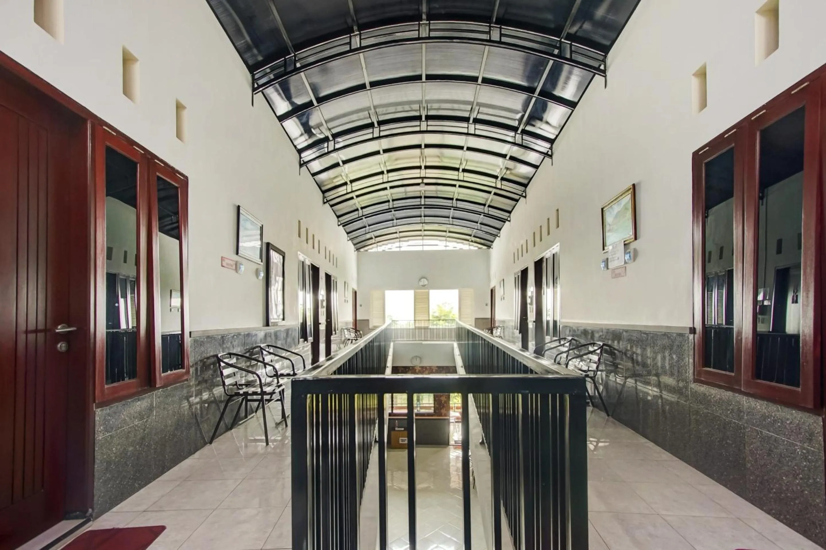 Lobby or reception in Capital O 90151 Guest House 180