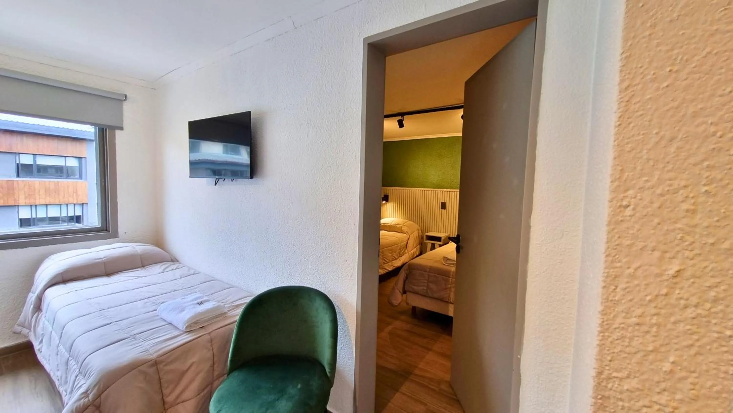 View (from property/room), Bed in M382 Hotel Bariloche