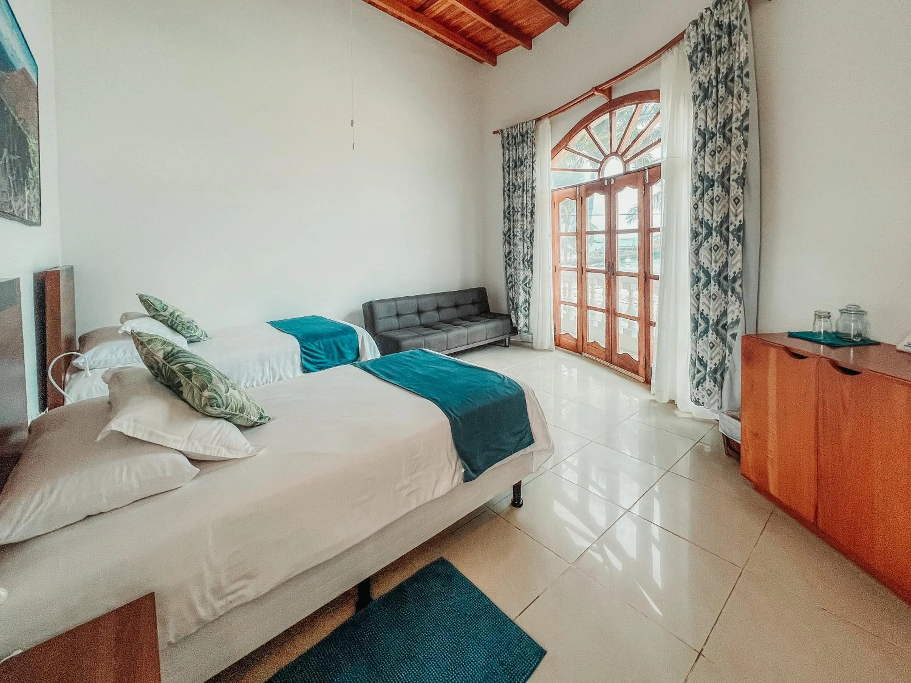 Bed in Hotel Albemarle Galapagos Beachfront