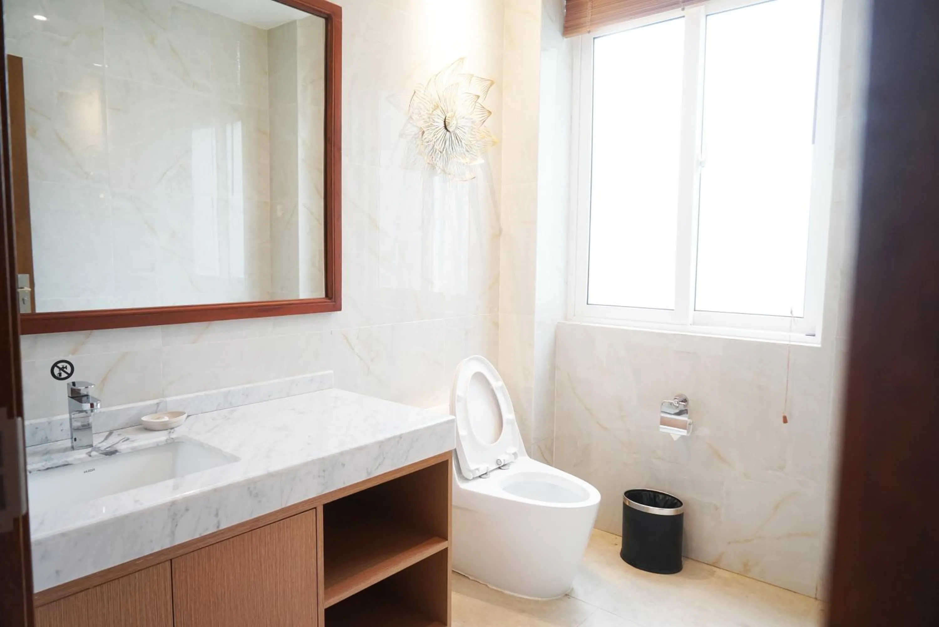 Toilet in NDC Resort & Spa