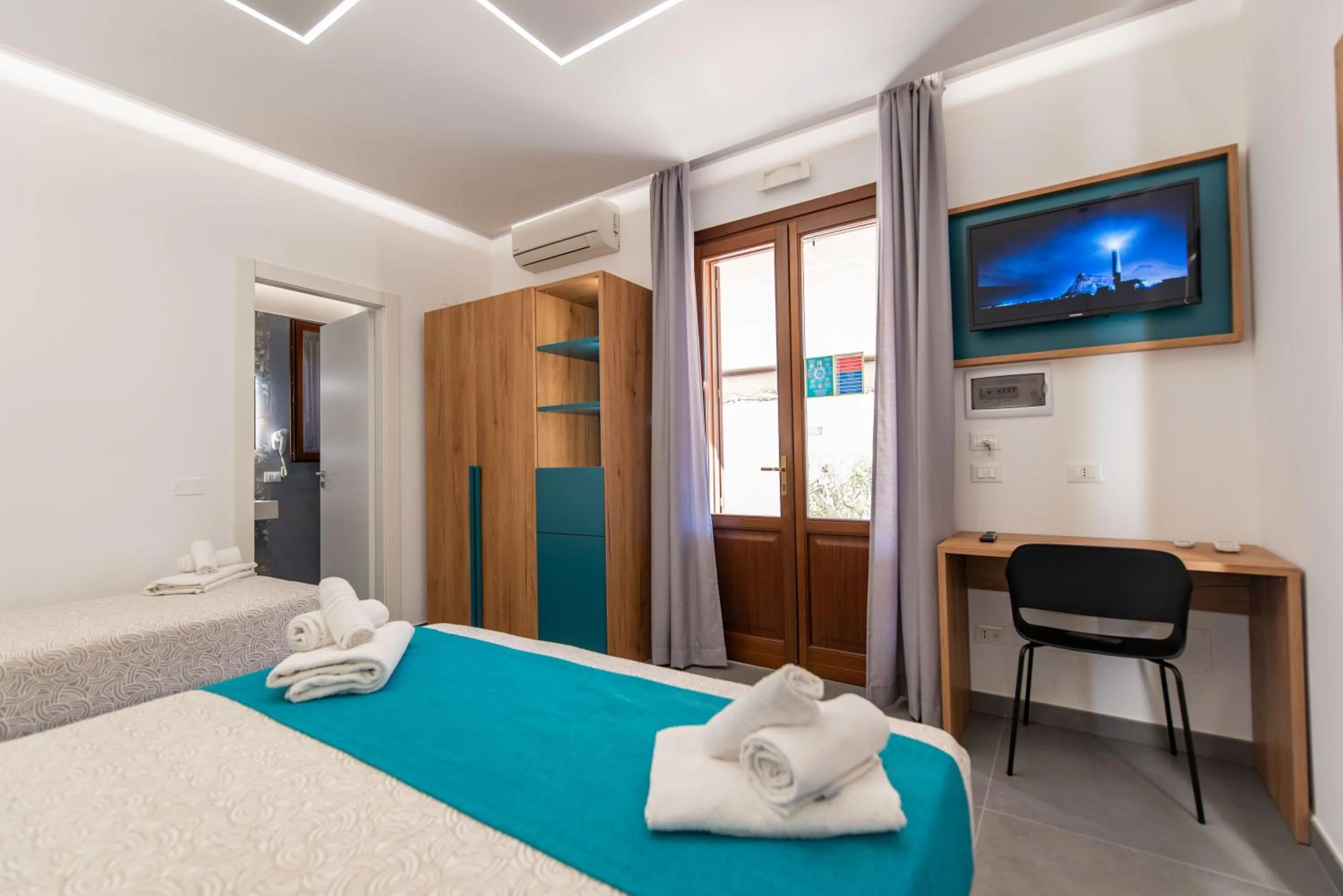 TV and multimedia, Bed in Affittacamere Aloe