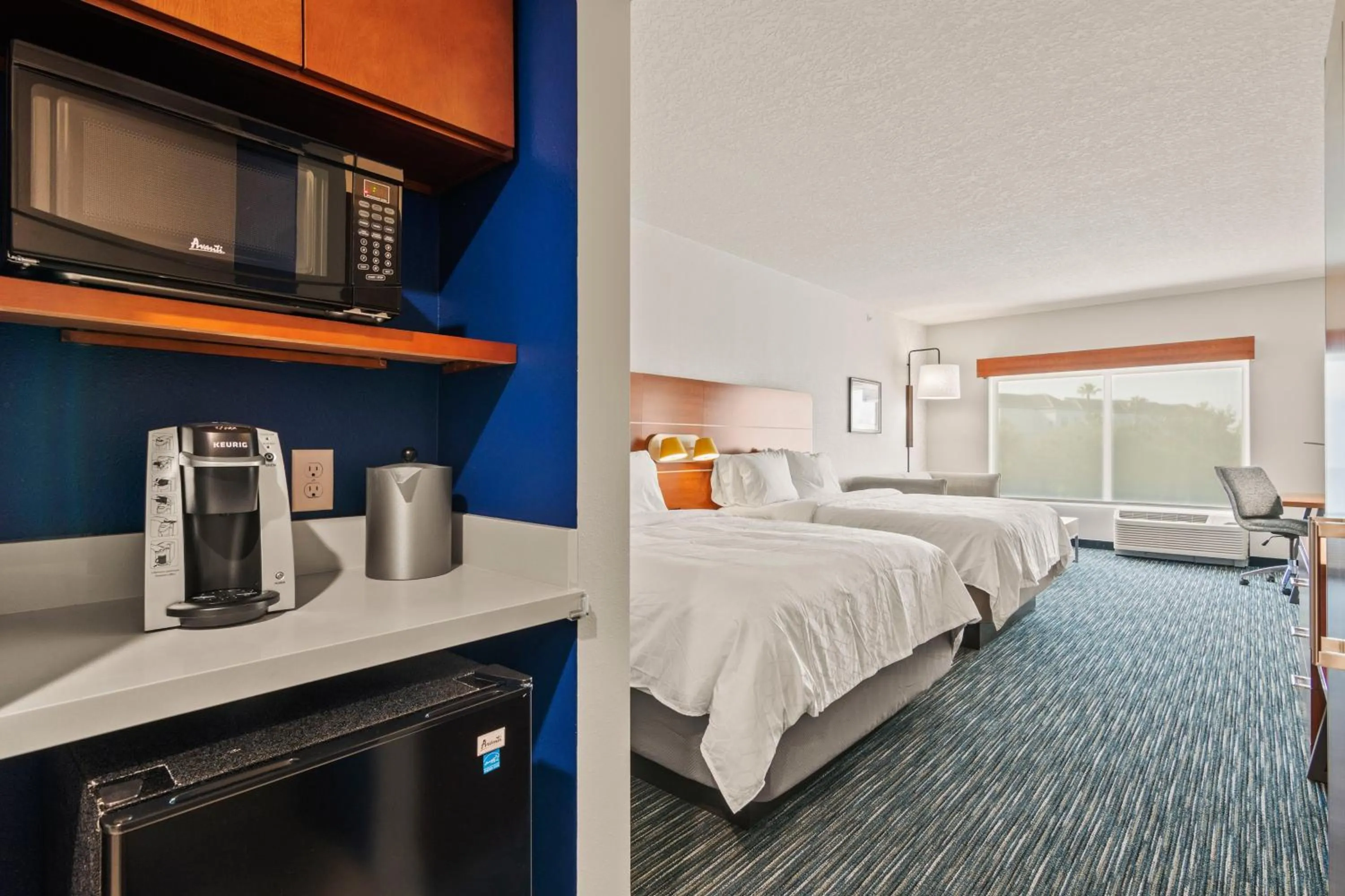 Photo of the whole room, Bed in Holiday Inn Express & Suites Orlando- Lake Buena Vista by IHG