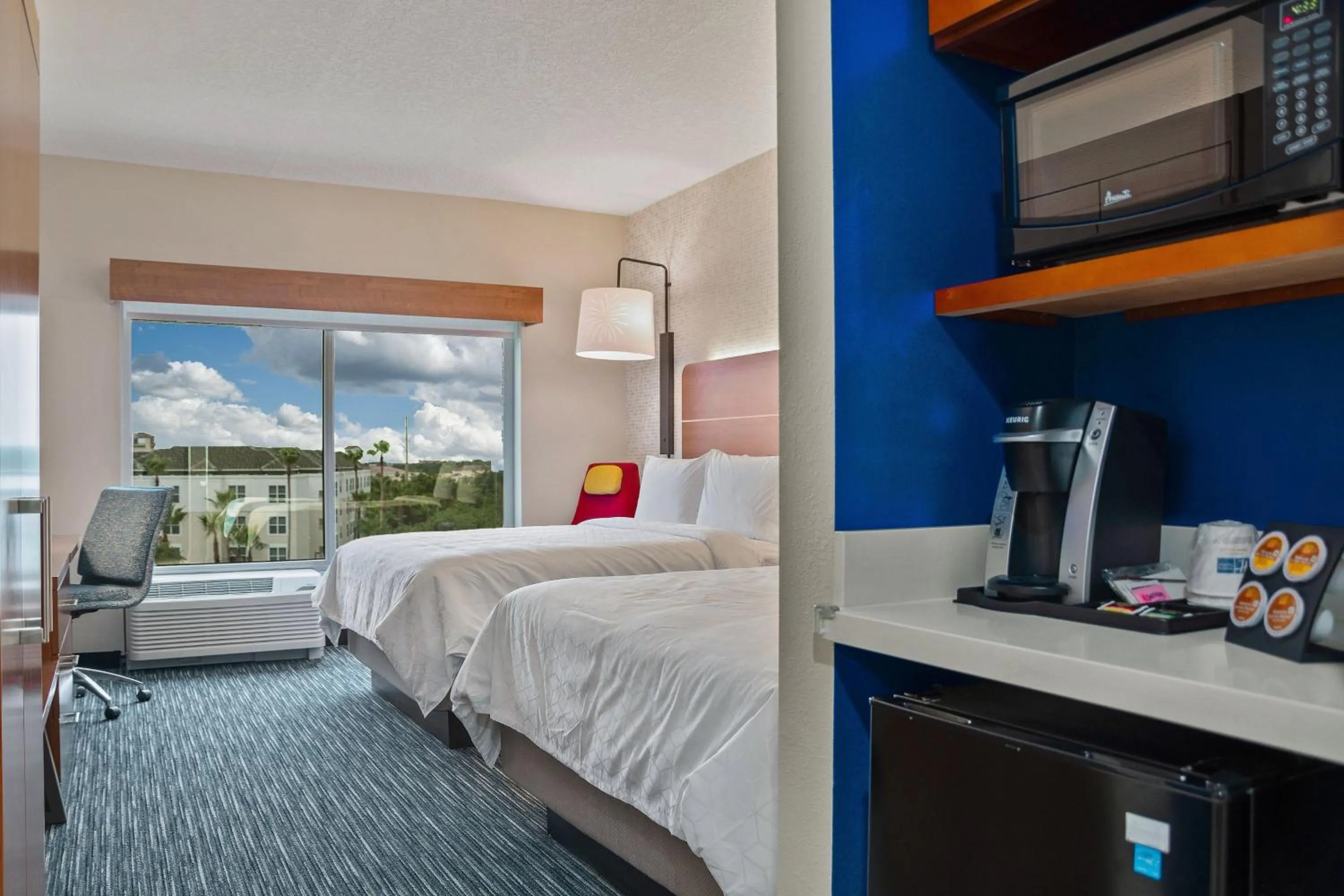 Photo of the whole room, Bed in Holiday Inn Express & Suites Orlando- Lake Buena Vista by IHG