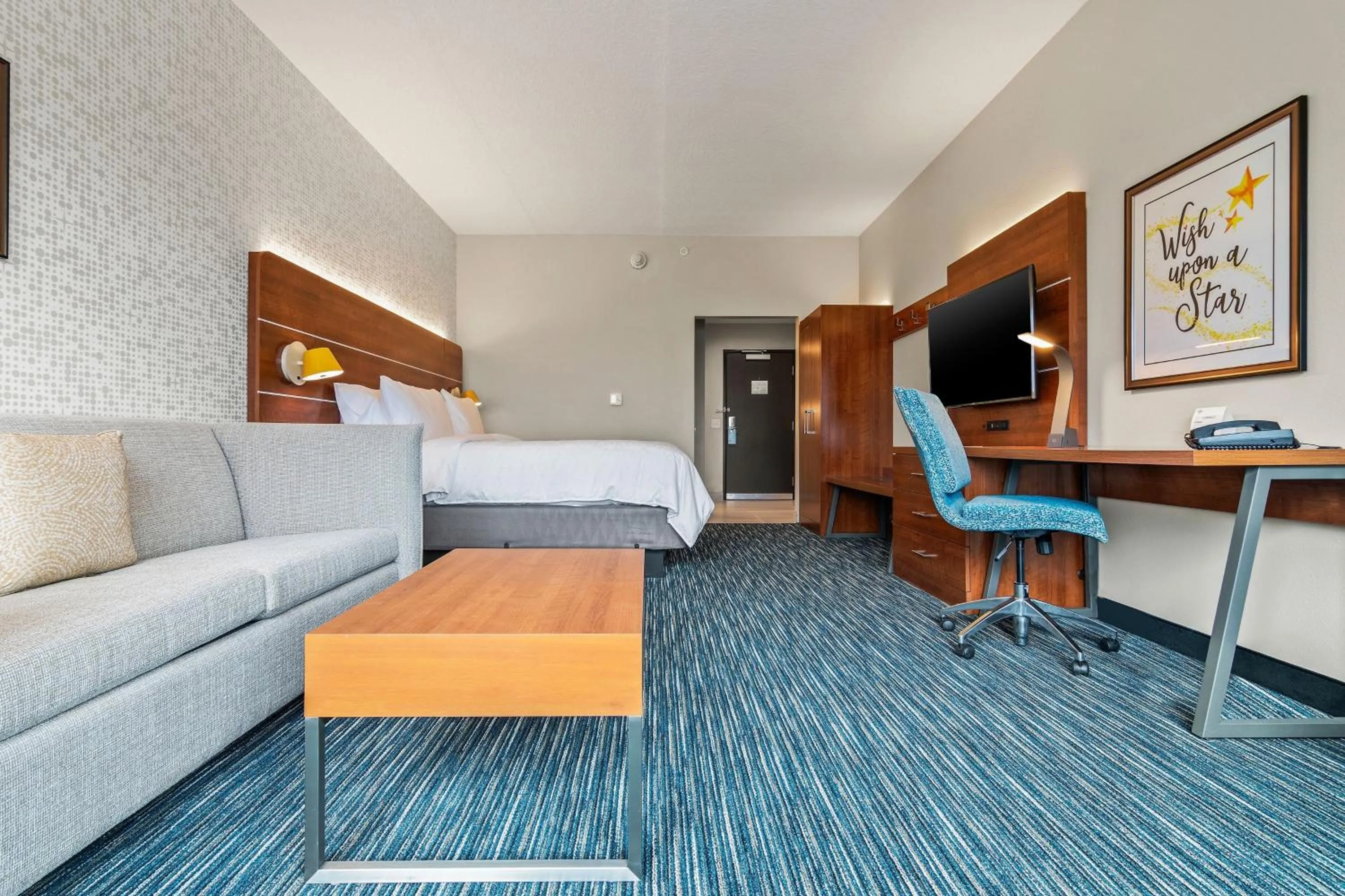 Photo of the whole room, Bed in Holiday Inn Express & Suites Orlando- Lake Buena Vista by IHG