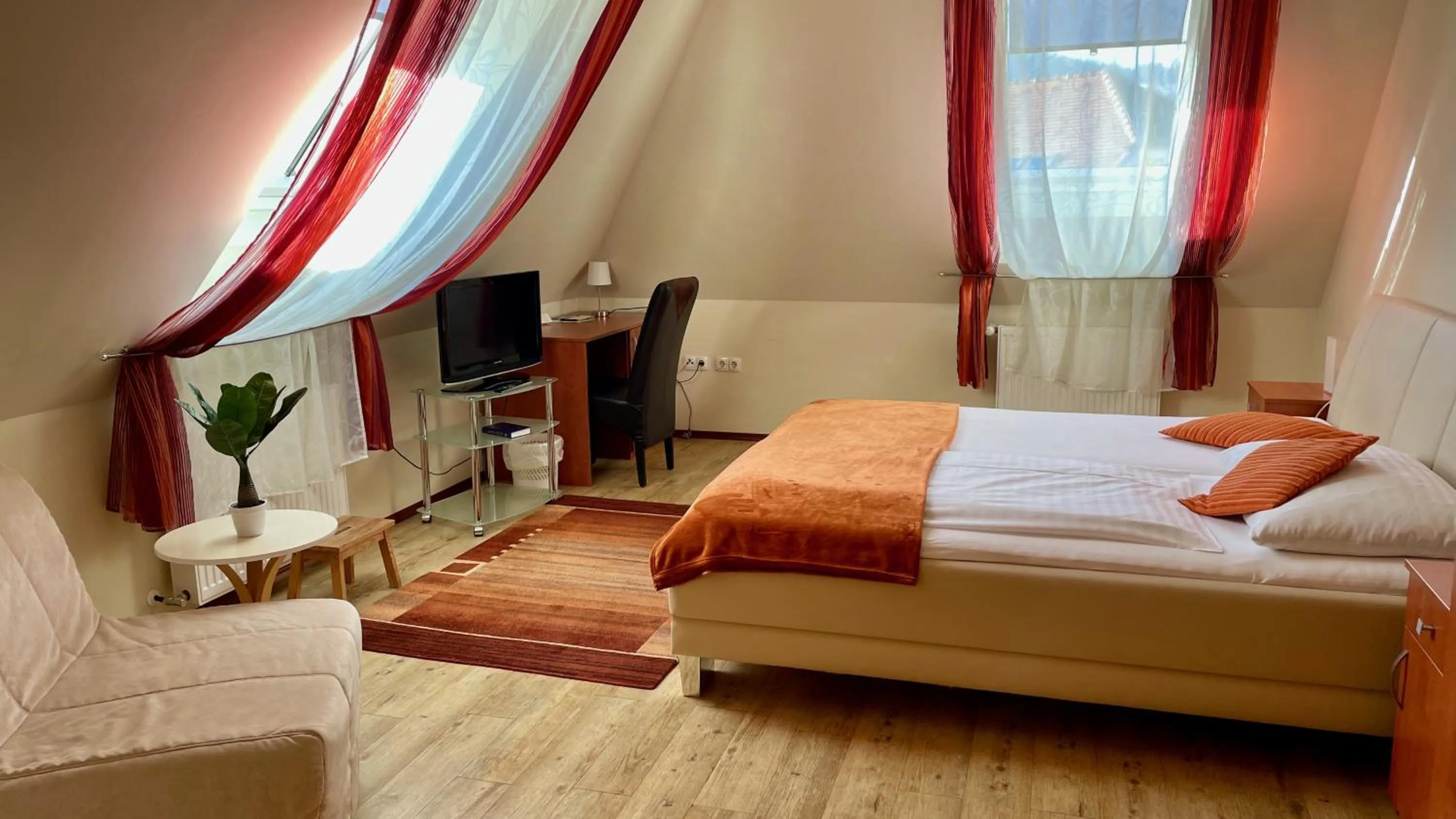 Photo of the whole room in Gösser BACHGASSLHOF -- Bed and Breakfast -- Apartments