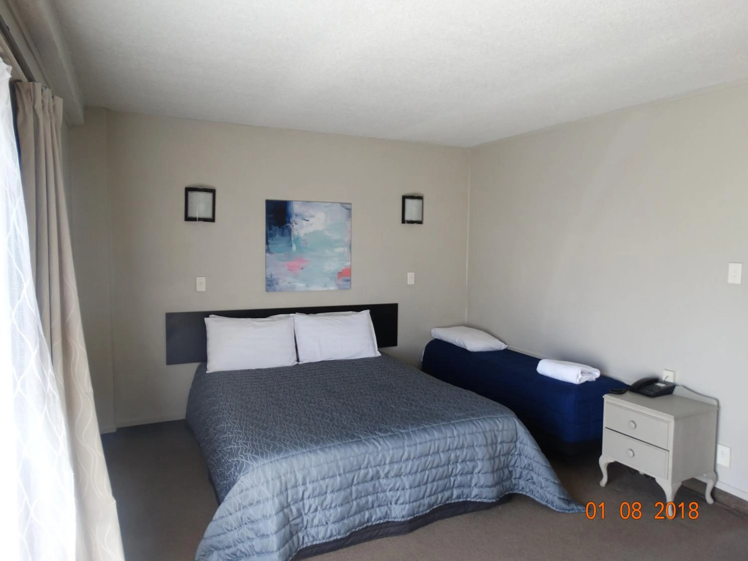 Bed in Ambassador Motel