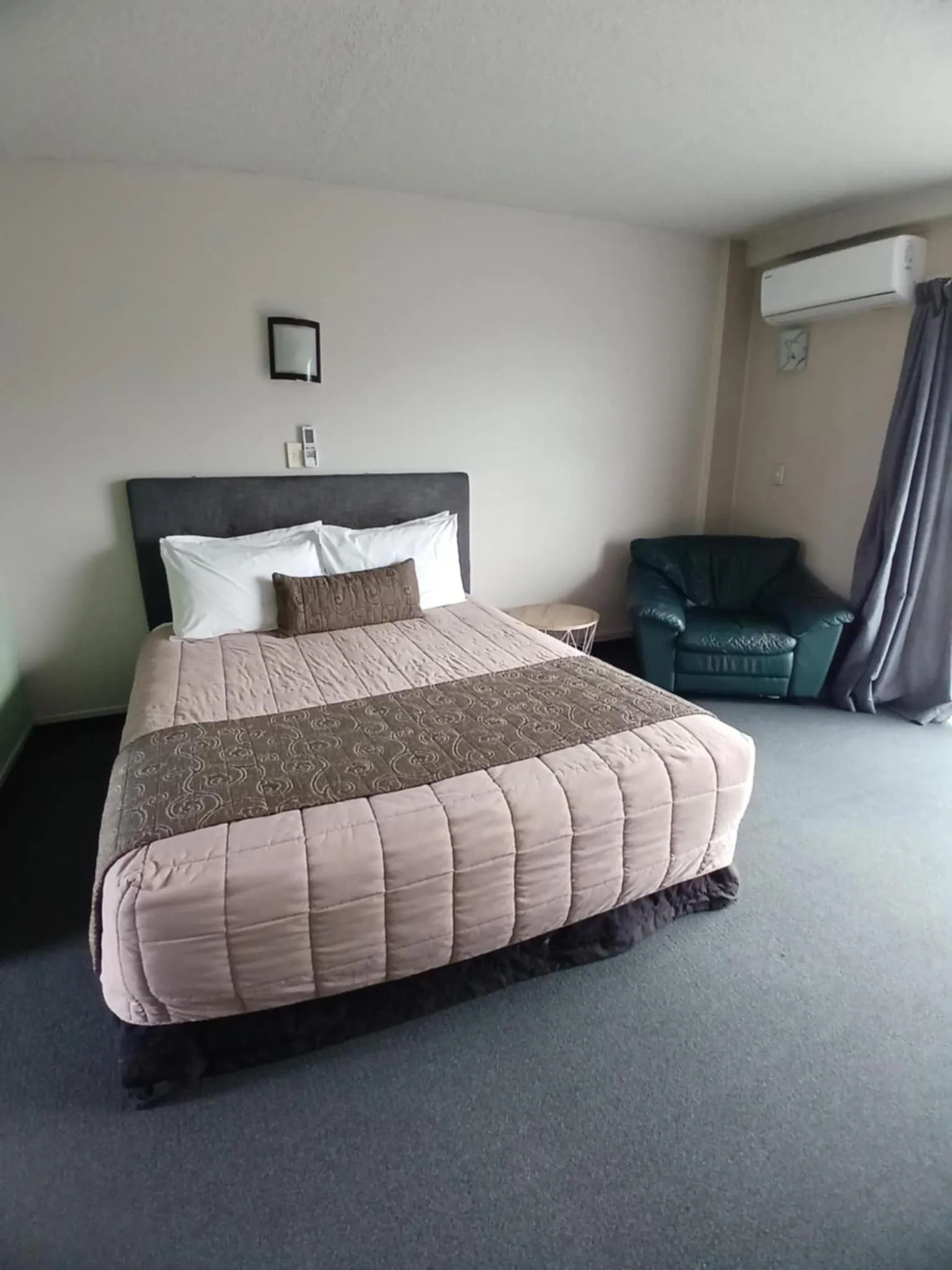 Bed in Ambassador Motel