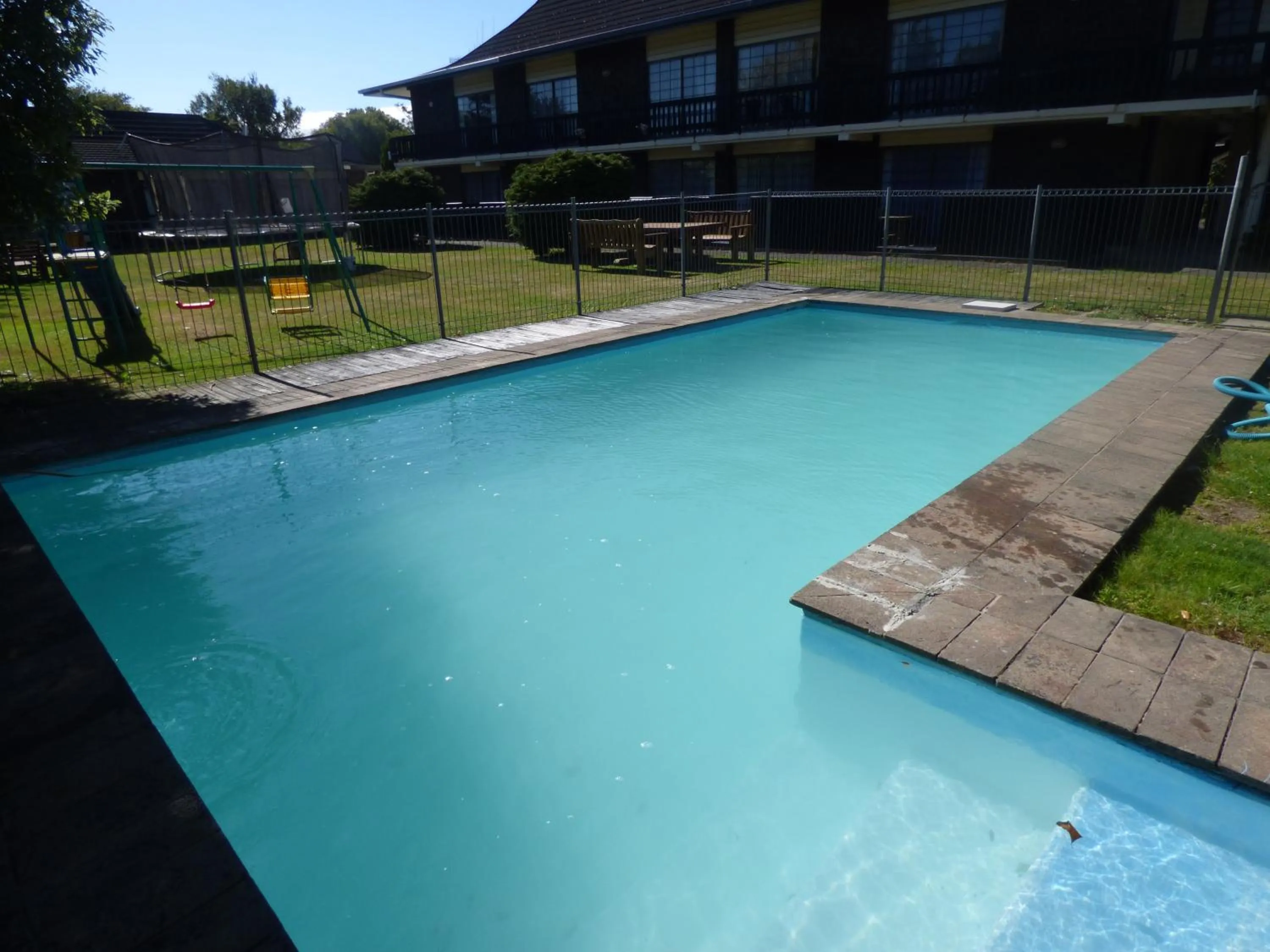 Swimming pool in Ambassador Motel
