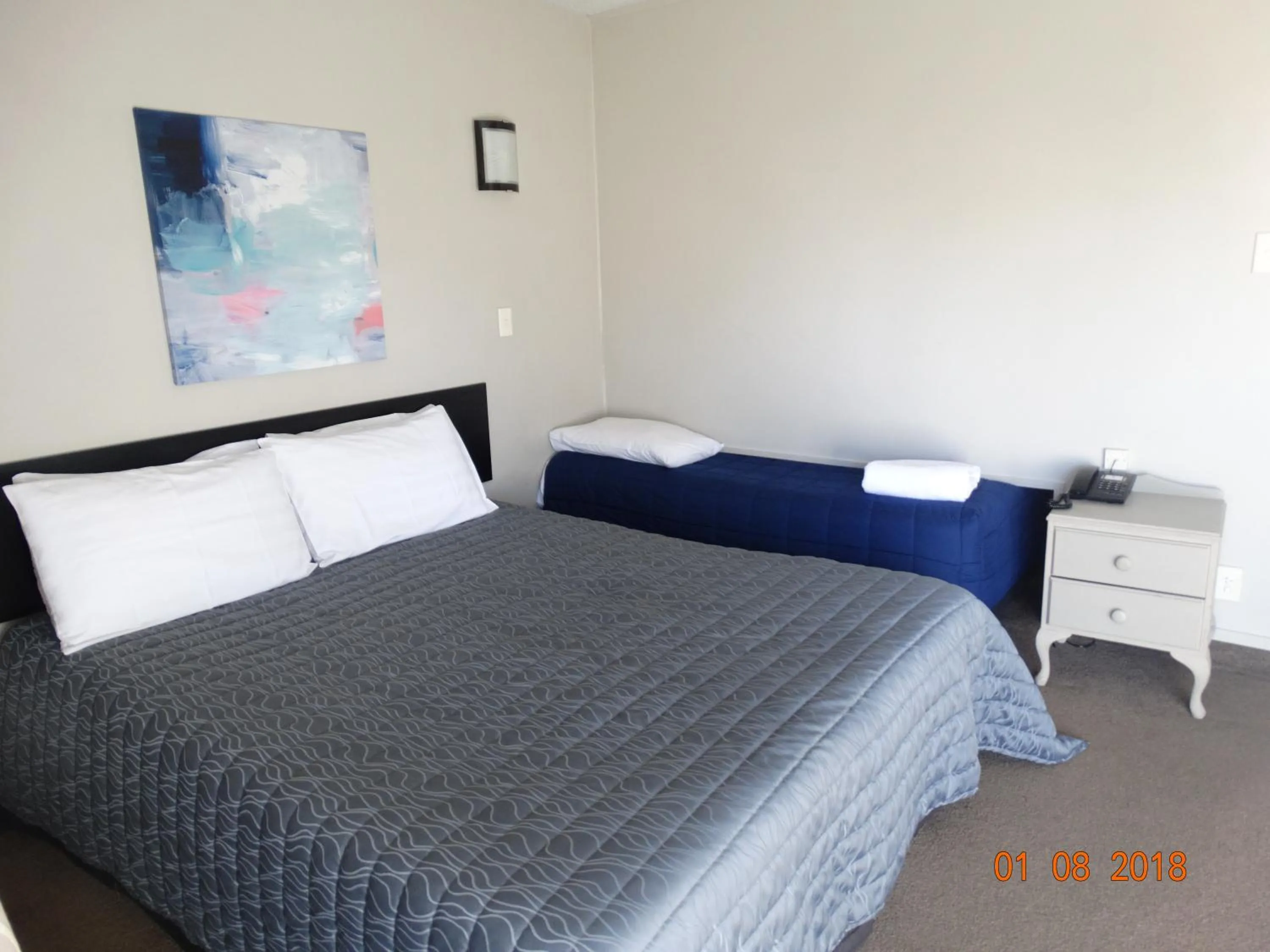 Bed in Ambassador Motel