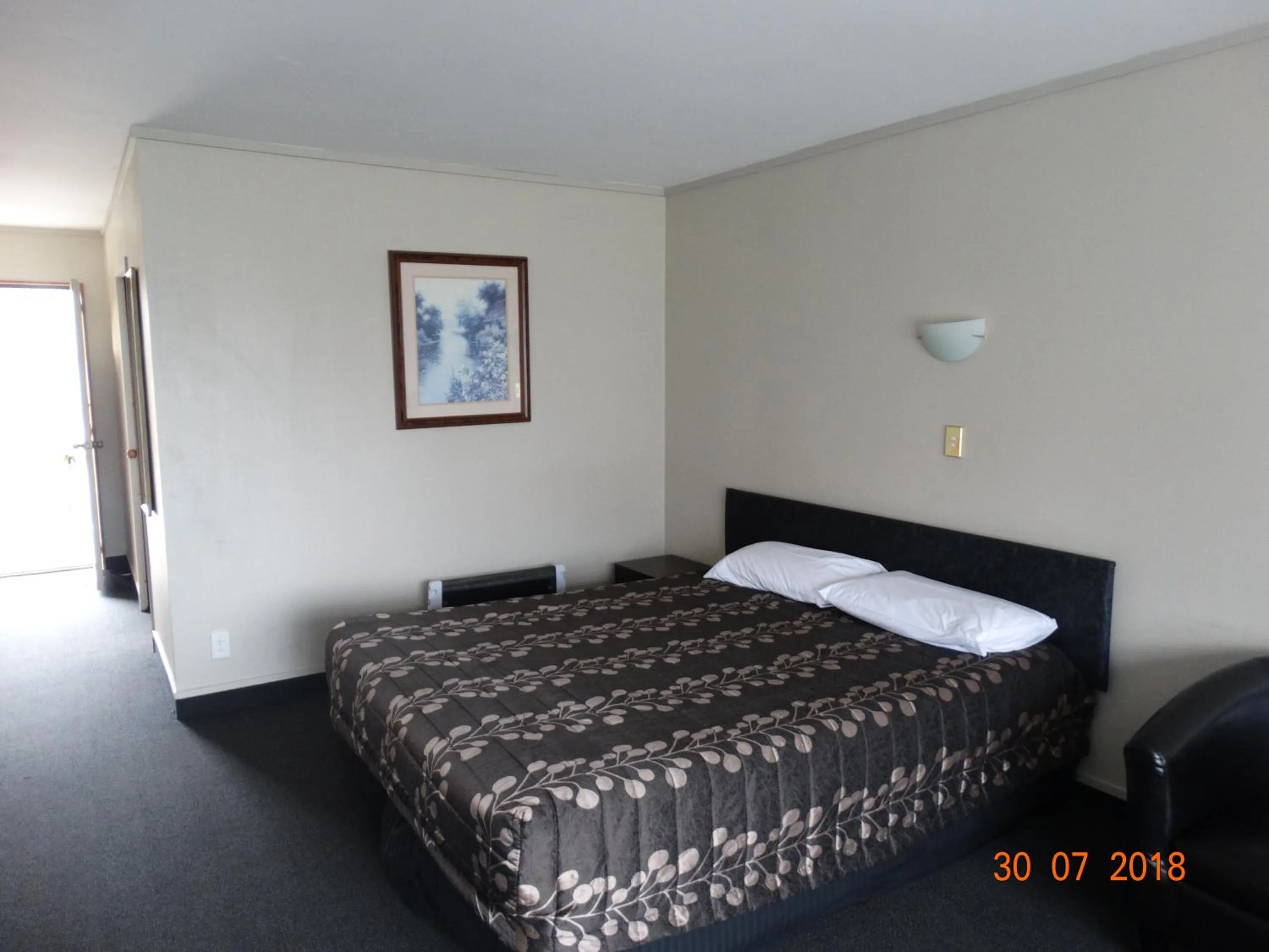 Bed in Ambassador Motel