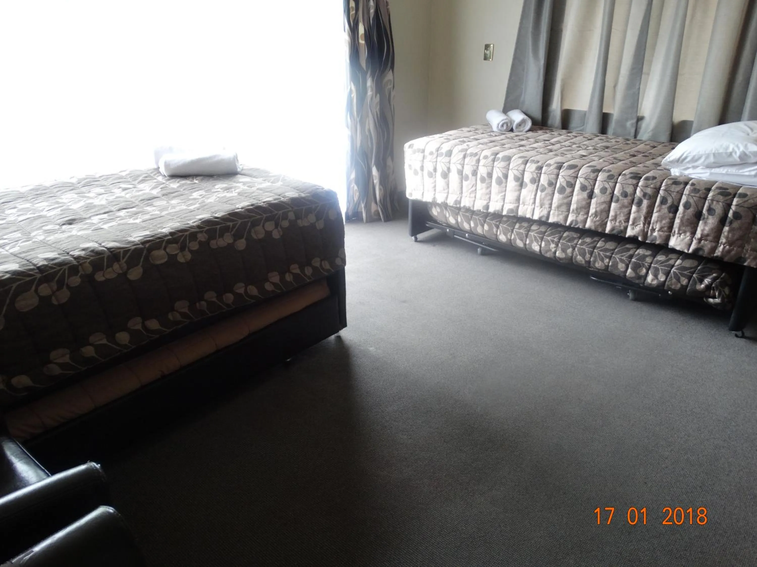 Bed in Ambassador Motel